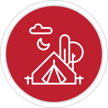 Red circular icon with a tent and trees under moon and clouds.