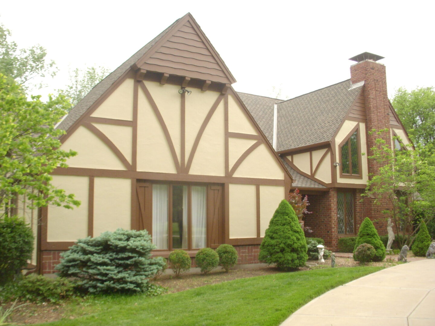 Classic Tudor-style house with wooden beams and brick exterior.