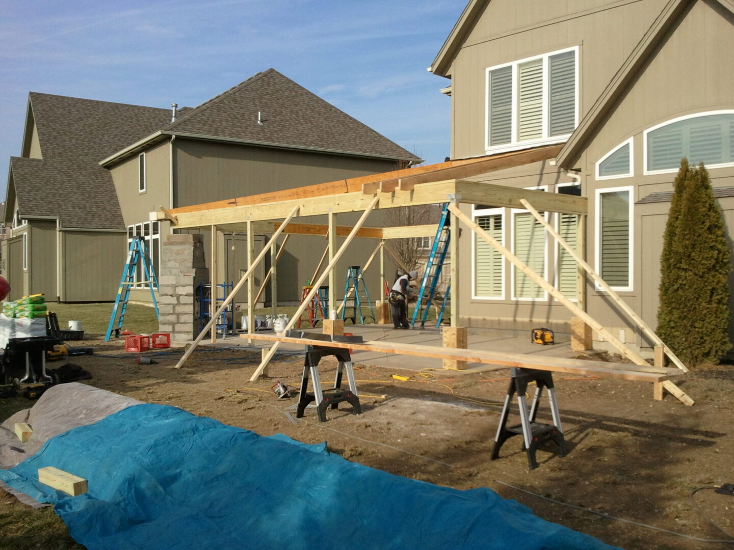 Wooden backyard patio cover under construction