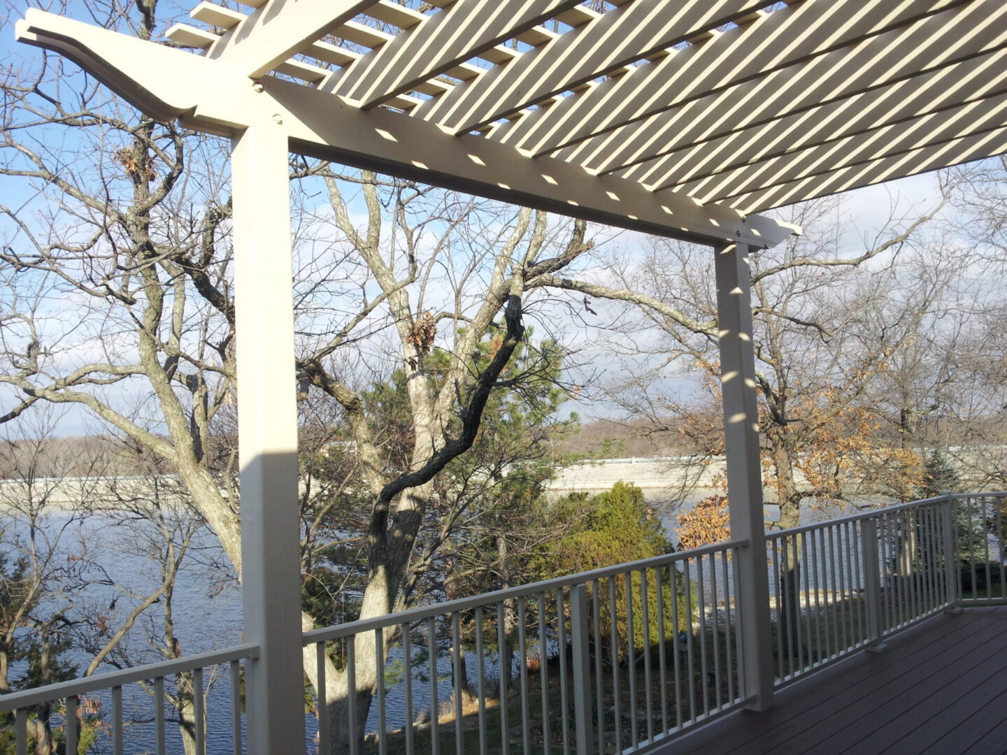Lake view deck with pergola and railing