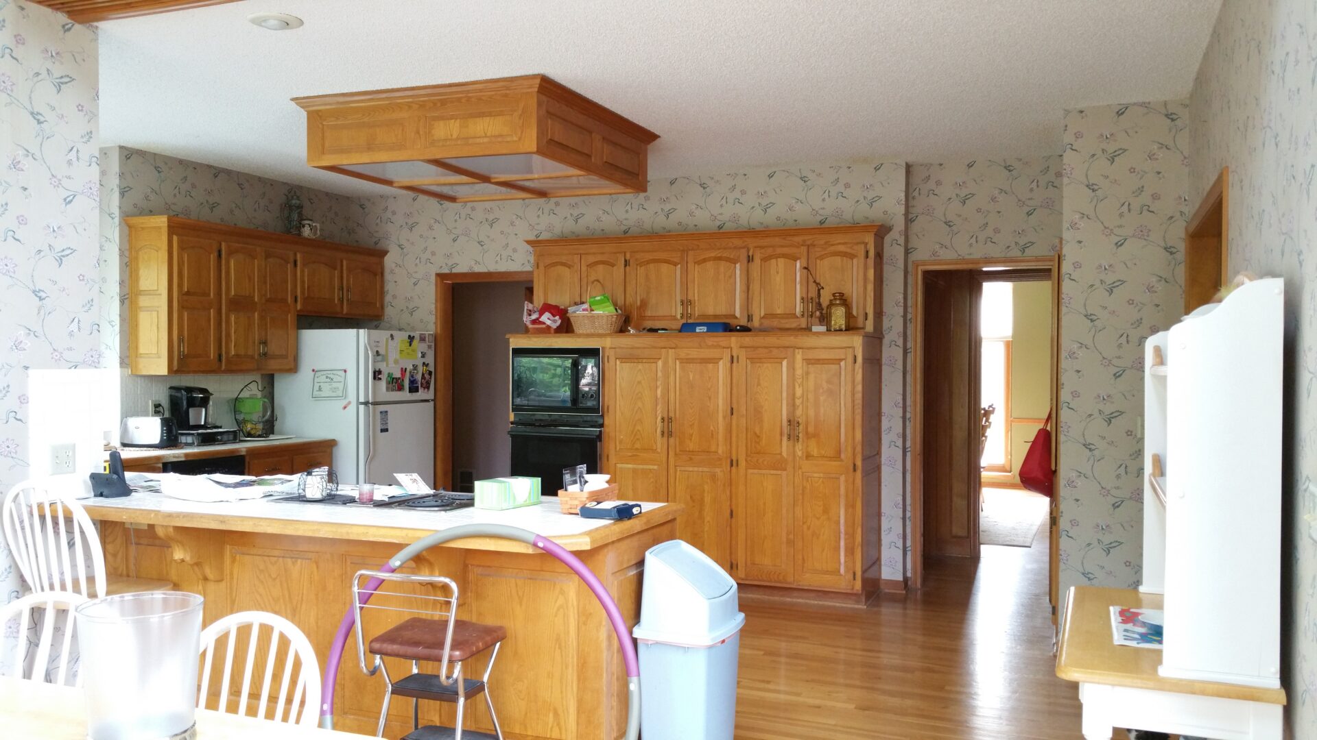 Kitchen with wooden cabinets and island