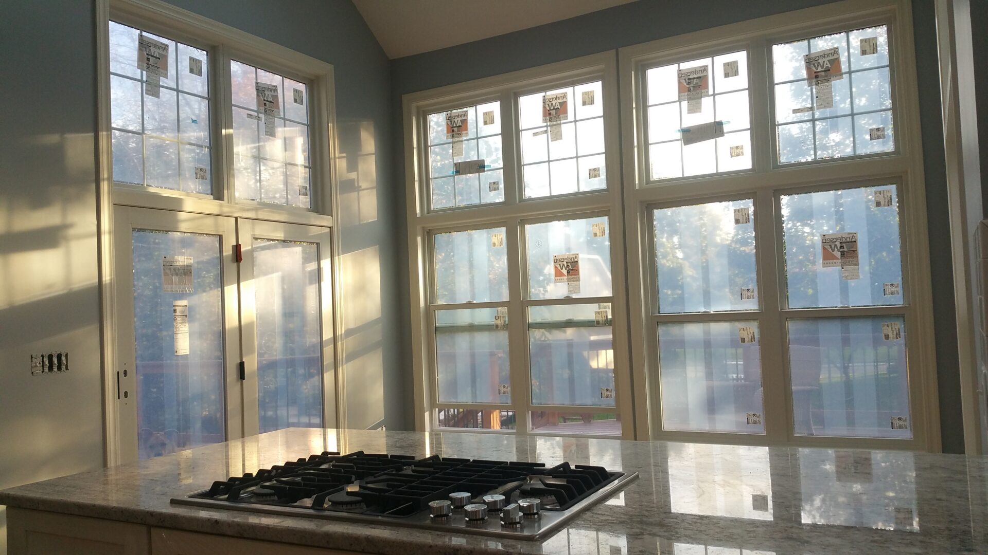 Sunlit kitchen island with gas cooktop