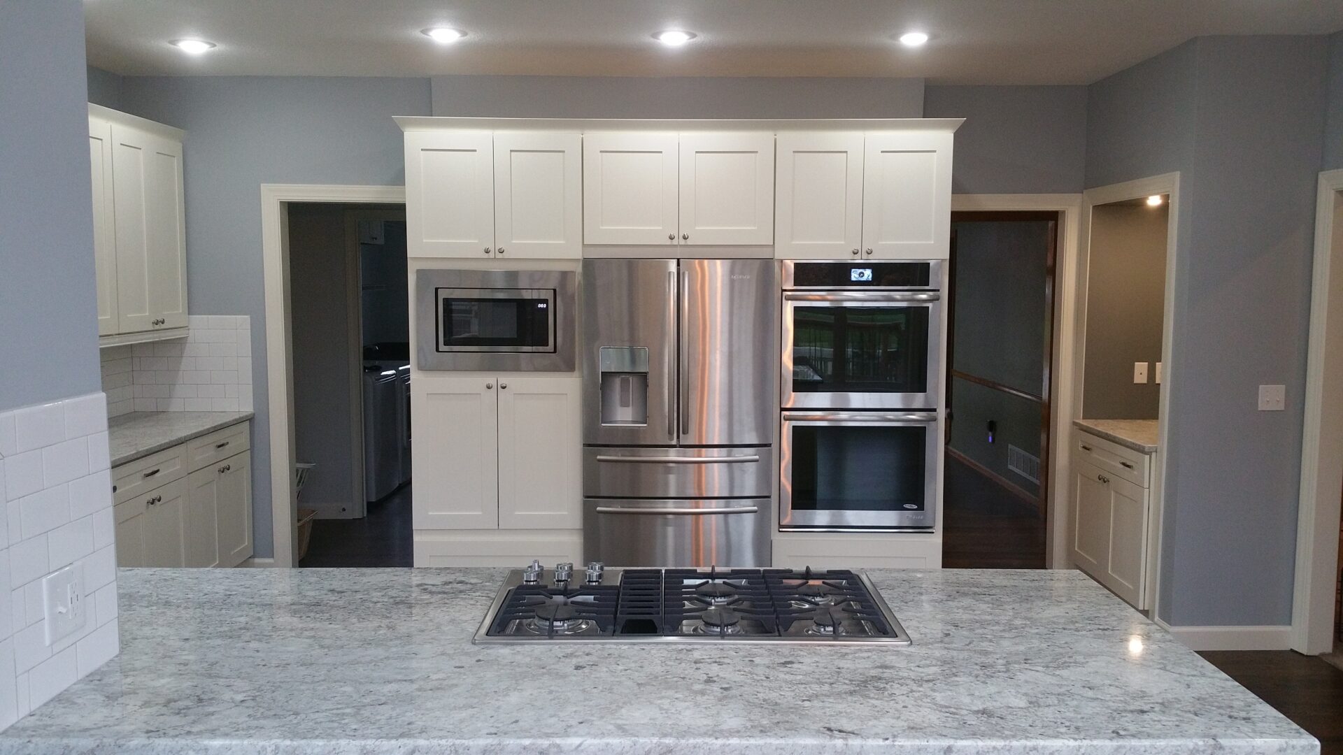 Modern kitchen with island and stainless appliances