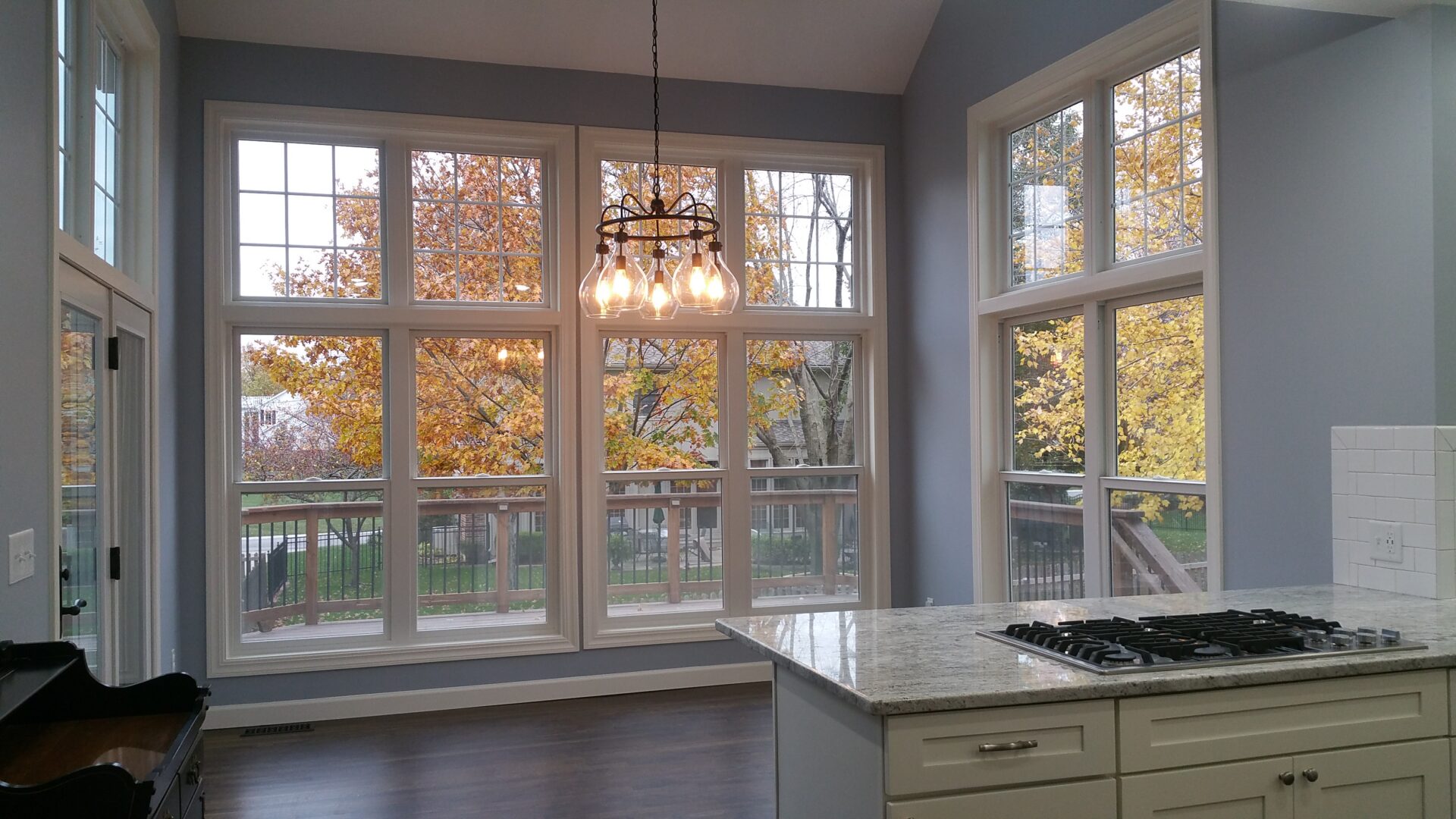 Bright kitchen with large windows and island