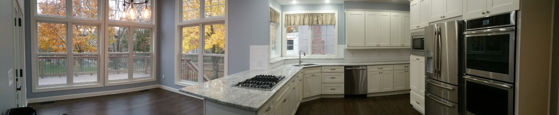 Modern white kitchen with marble island