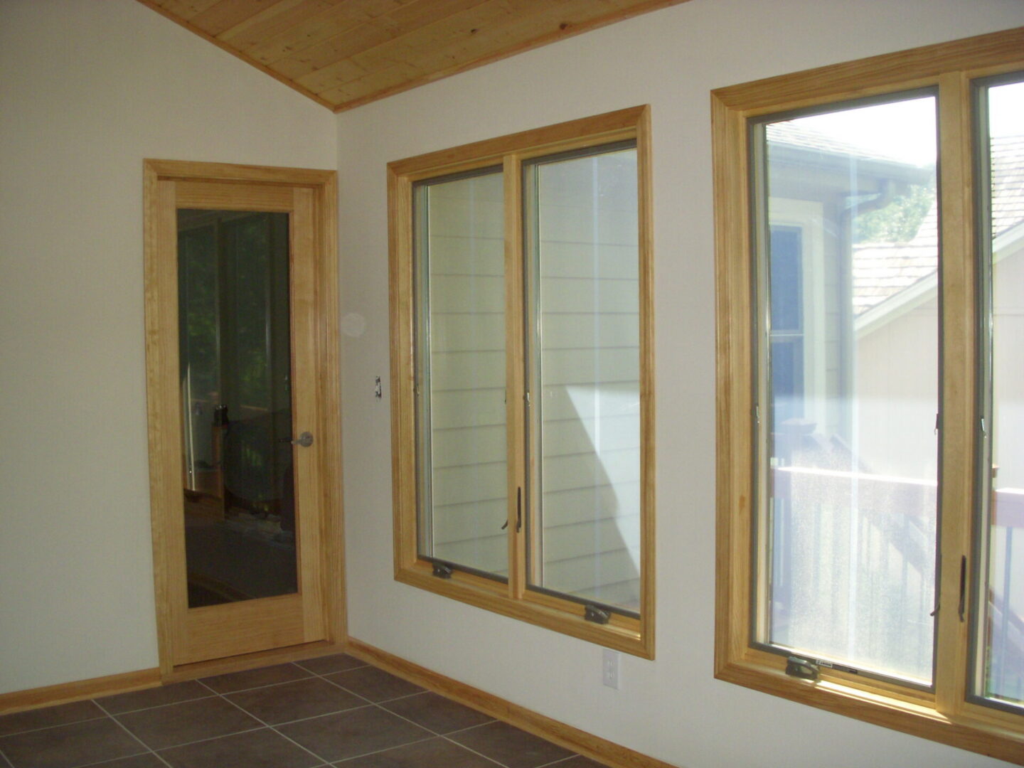 Interior room with wooden windows and door