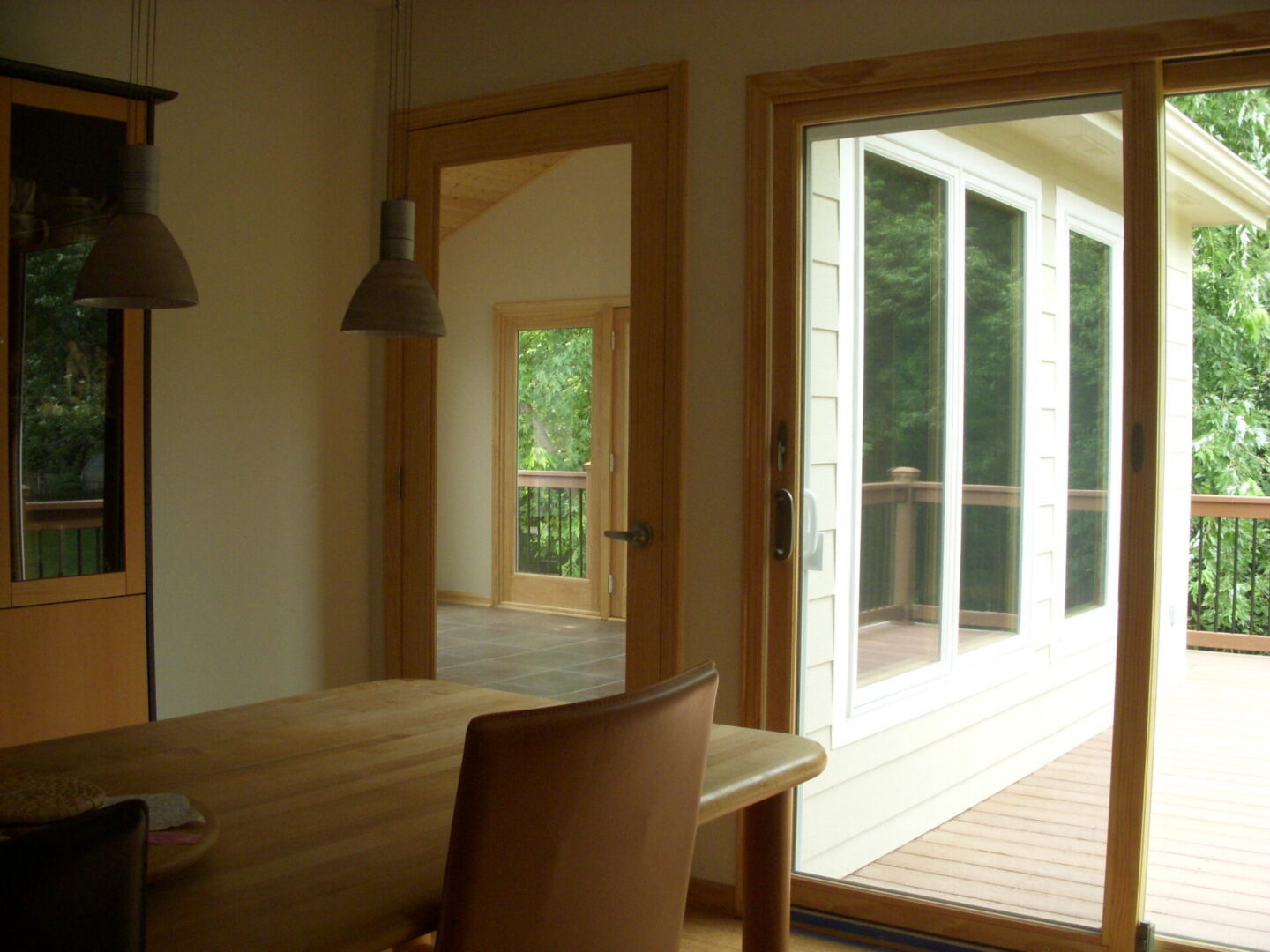 Dining area with sliding glass door to deck
